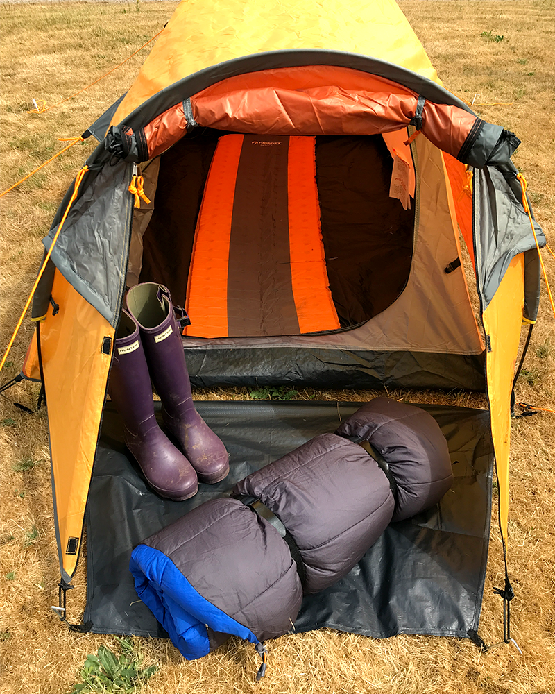 Camping Tip - Roll Up Your Sleeping Bag with a VELCRO® Brand Strap 2